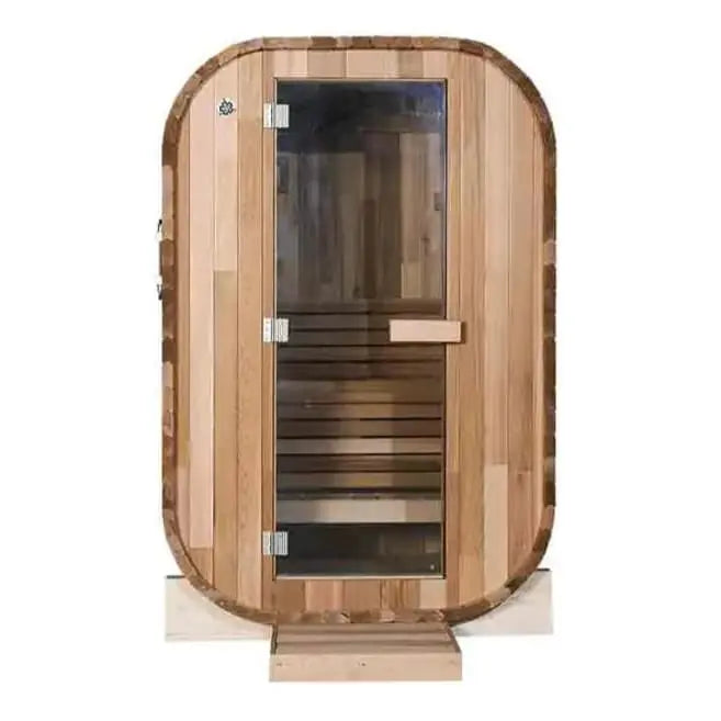 The Lunara Pod Sauna is a compact outdoor sauna crafted from Canadian Cedar, featuring a rounded rectangular shape, glass front door, wood steps, and light wood benches for a stylish and comfortable relaxation experience.