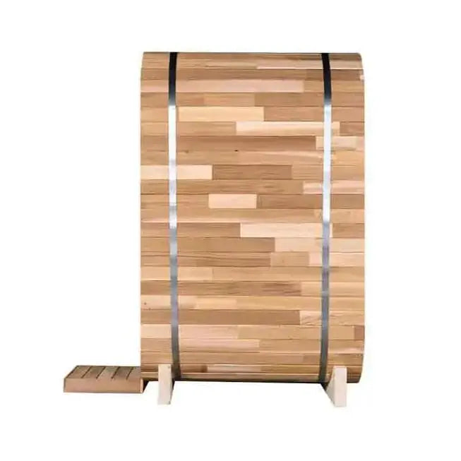 The Lunara Pod Sauna, a Canadian cedar barrel-shaped unit with metal bands, stands upright on two supports and includes a small wooden step at the door to enhance your wellness experience.